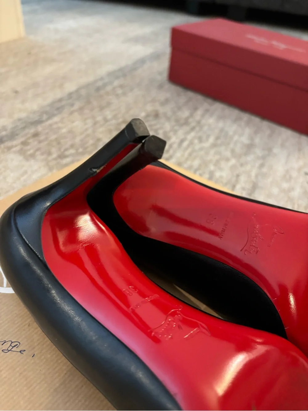 Christian Louboutin Black Leather Round-Toe Pumps with Red Soles
